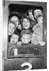 Cheerful train evacuees by Associated Newspapers