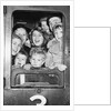 Cheerful train evacuees by Associated Newspapers