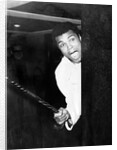 Muhammad Ali larking about at Heathrow by Associated Newspapers