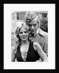 Michael Caine with Britt Ekland by Associated Newspapers