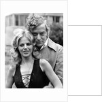 Michael Caine with Britt Ekland by Associated Newspapers