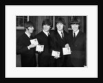 The Beatles show their MBEs by Associated Newspapers