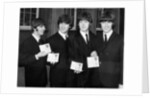 The Beatles show their MBEs by Associated Newspapers