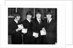 The Beatles show their MBEs by Associated Newspapers