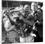 Sir Stirling Moss, racing driver after winning his first British Grand Prix in 1955 by Associated Newspapers