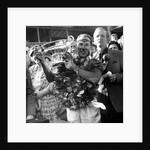 Sir Stirling Moss, racing driver after winning his first British Grand Prix in 1955 by Associated Newspapers