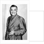 Clark Gable in a dressing gown by Associated Newspapers