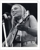 Joni Mitchell at a pop festival by Associated Newspapers