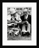 Racegoers relaxing by Associated Newspapers