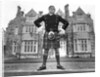 Oliver Reed in kilt by Associated Newspapers