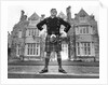 Oliver Reed in kilt by Associated Newspapers