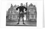 Oliver Reed in kilt by Associated Newspapers