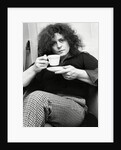 Marc Bolan with a cup of tea by Associated Newspapers
