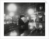 Flower Seller in the rain by Associated Newspapers