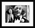 Ken Dodd on stage by Associated Newspapers