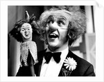 Ken Dodd on stage by Associated Newspapers