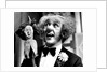 Ken Dodd on stage by Associated Newspapers