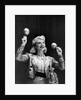 Dance band leader with maracas by Associated Newspapers
