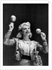 Dance band leader with maracas by Associated Newspapers