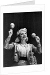 Dance band leader with maracas by Associated Newspapers