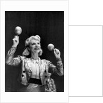 Dance band leader with maracas by Associated Newspapers
