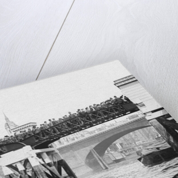 Passengers for the river bus service on the footbridge to London Bridge Pier, London by Anonymous