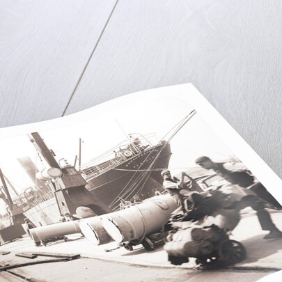 Unloading rolls of paper from a ship, London by Anonymous