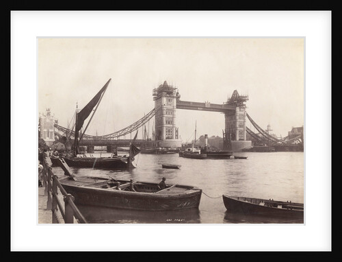 View of Tower Bridge under construction with river traffic in the foreground, London by Anonymous
