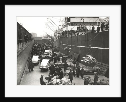 Cargo being loaded or unloaded from a ship, Royal Victoria Dock, Canning Town, London by Anonymous