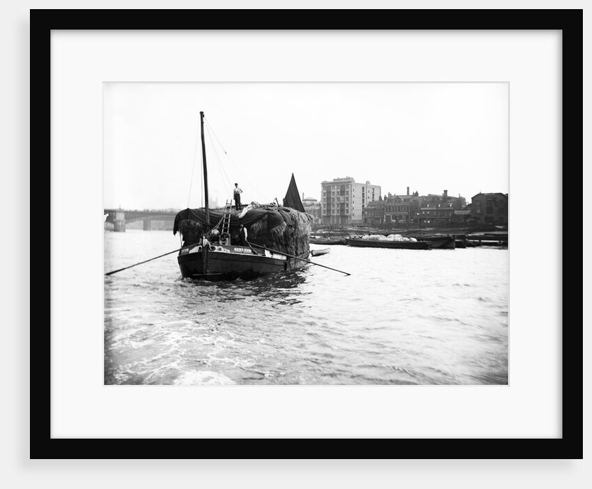 Dumpy barge on the Thames loaded with hay or esparto, London by Anonymous