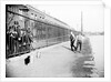 Boys fishing across a canal towpath, London by Anonymous