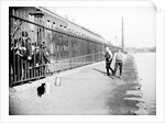 Boys fishing across a canal towpath, London by Anonymous