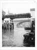 Passengers for the river bus service on the footbridge to London Bridge Pier, London by Anonymous