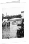 Passengers for the river bus service on the footbridge to London Bridge Pier, London by Anonymous