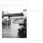 Passengers for the river bus service on the footbridge to London Bridge Pier, London by Anonymous