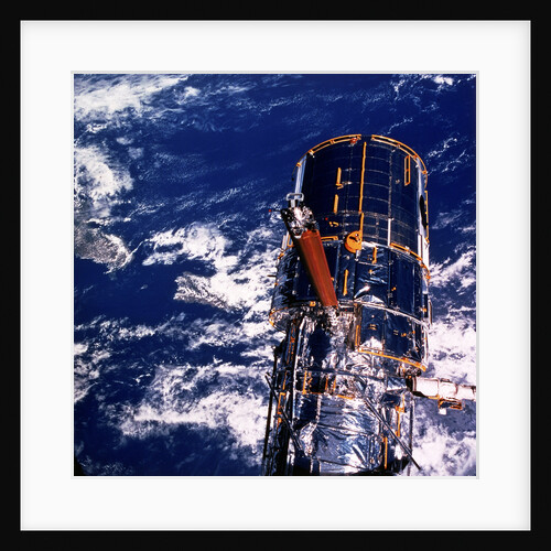 Hubble Space Telescope above the Earth by Unknown