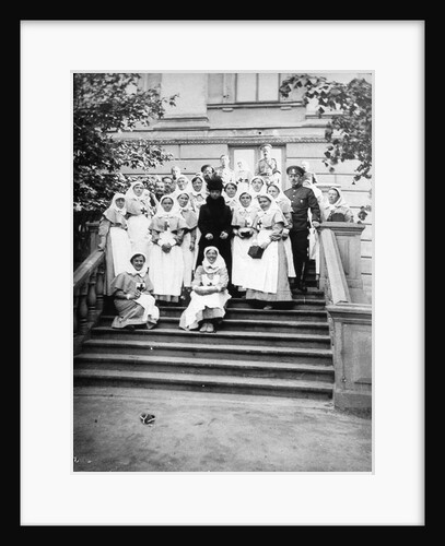 Dowager Empress Maria Feodorovna of Russia with nurses outside a hospital, Russia, 1916 by Unknown