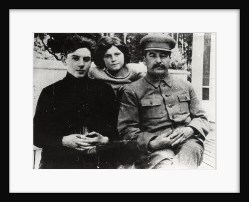 Soviet leader Josef Stalin with his son Vasily and daughter Svetlana, 1930s. by Pyotr Otsup.