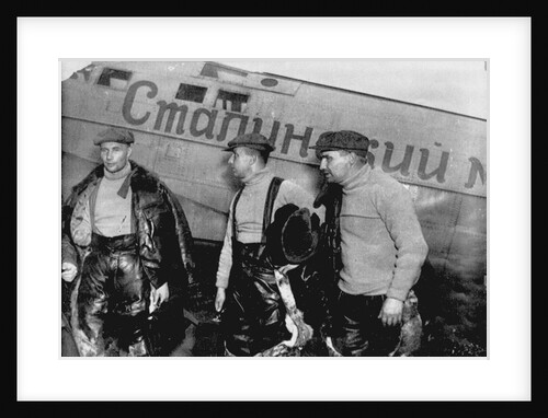 Alexander Belyakov, Georgiy Baidukov and Valery Chkalov by their plane on June 20, 1937 by Anonymous