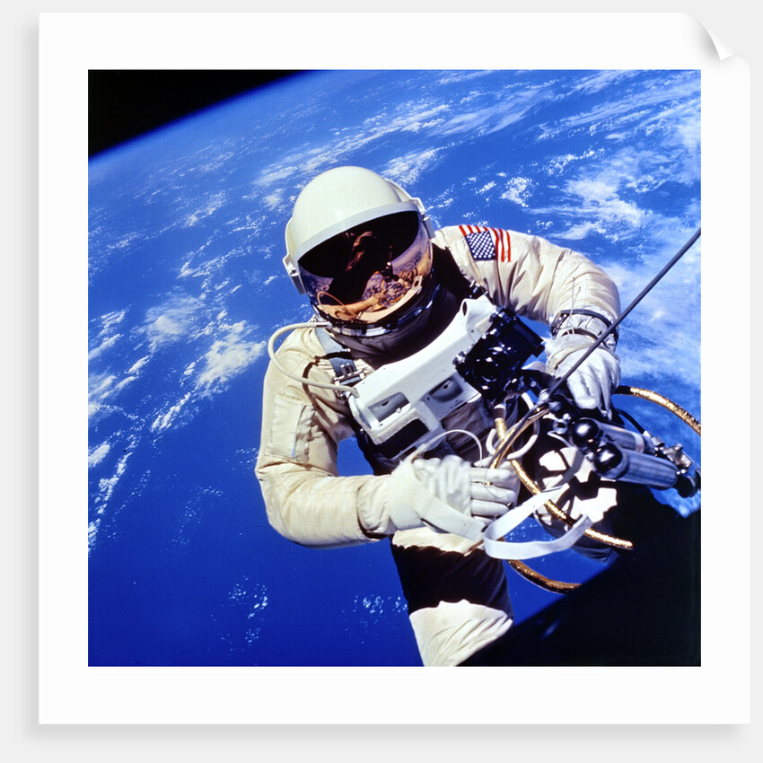 US Astronaut Edward H. White II carrying out external tasks by Unknown