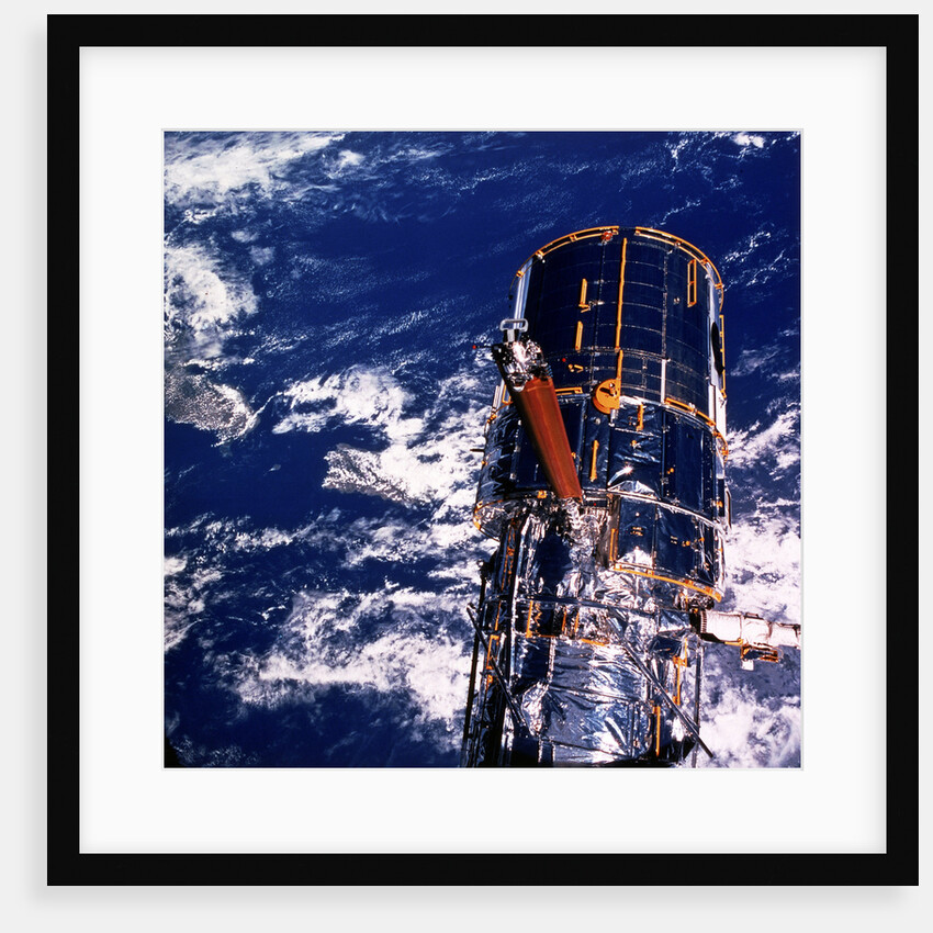 Hubble Space Telescope above the Earth by Unknown
