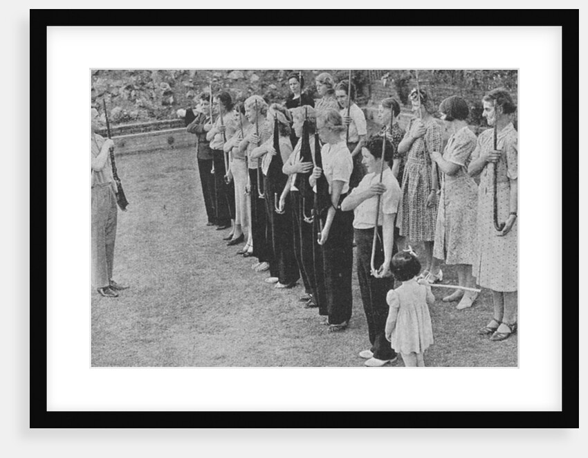 Members of the Women's Volunteer Defence Corps being trained in rifle drill, World War II, 1940 by Unknown