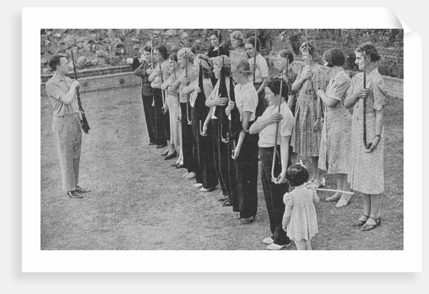 Members of the Women's Volunteer Defence Corps being trained in rifle drill, World War II, 1940 by Unknown