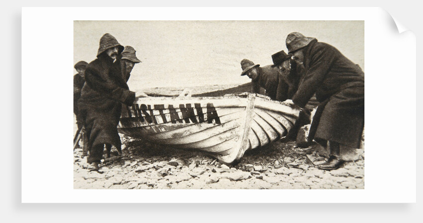 Hauling one of the Lusitania's lifeboats onto the beach, Ireland, 8 May 1915 by Clarke & Hyde
