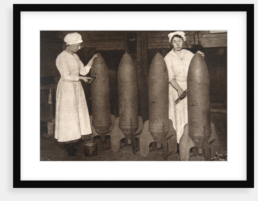 Women munitions workers putting a coat of paint on aerial bombs, World War I, c1914-c1918 by S and G