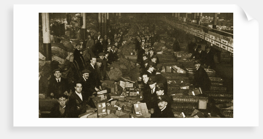 Sorting parcels at the Post Office, Mount Pleasant, London, 20th century by Unknown