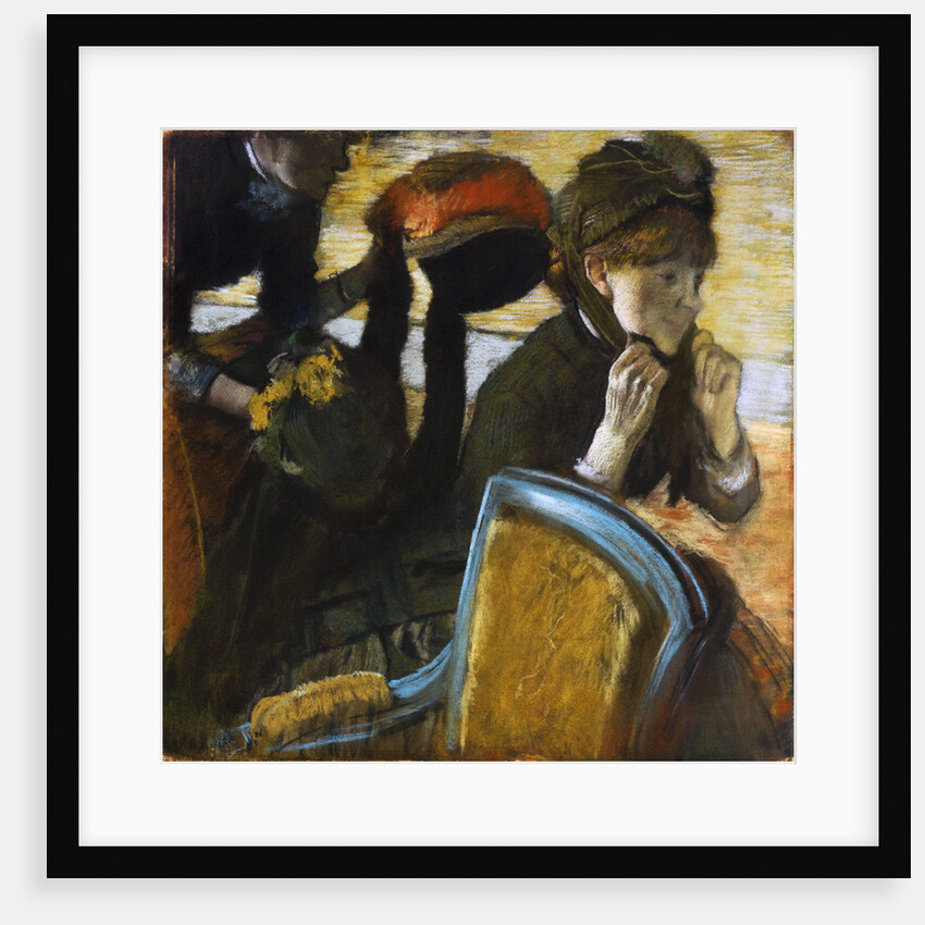 At the Milliner's by Edgar Degas