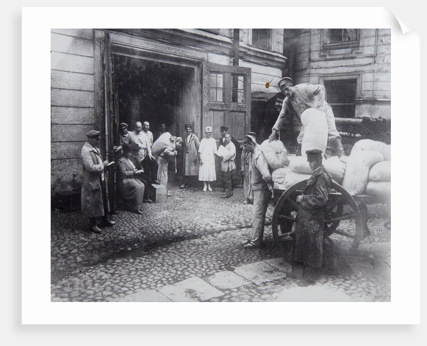 Unloading food, the House of Scientists, Petrograd, Russia, c1920-c1924(?) by Unknown
