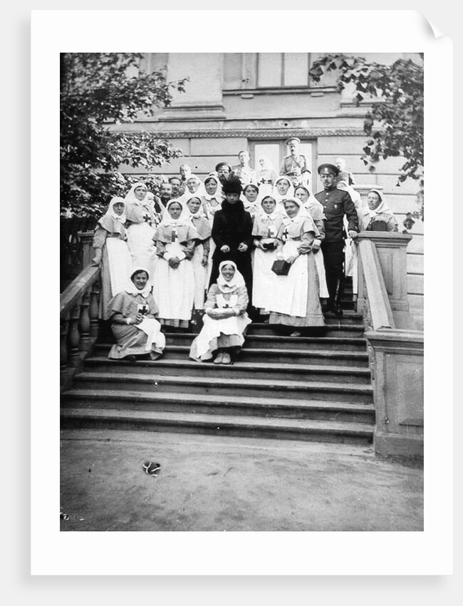 Dowager Empress Maria Feodorovna of Russia with nurses outside a hospital, Russia, 1916 by Unknown