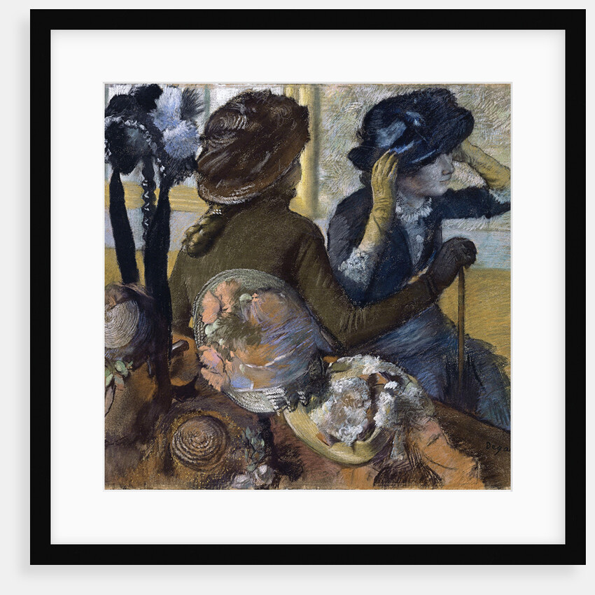 At the Milliner's by Edgar Degas